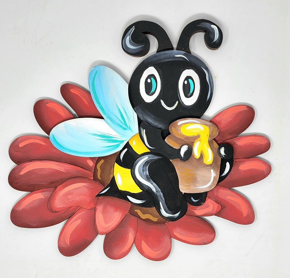 Design By Line Round MDF Cutout Bee Silhouette Sitting on a flower holding a jar of honey - Unfinished For DIY