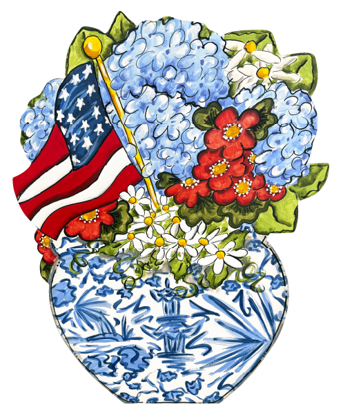 CINDY'S FLOWERS IN A BLUE AND WHITE POT WITH AMERICAN FLAG