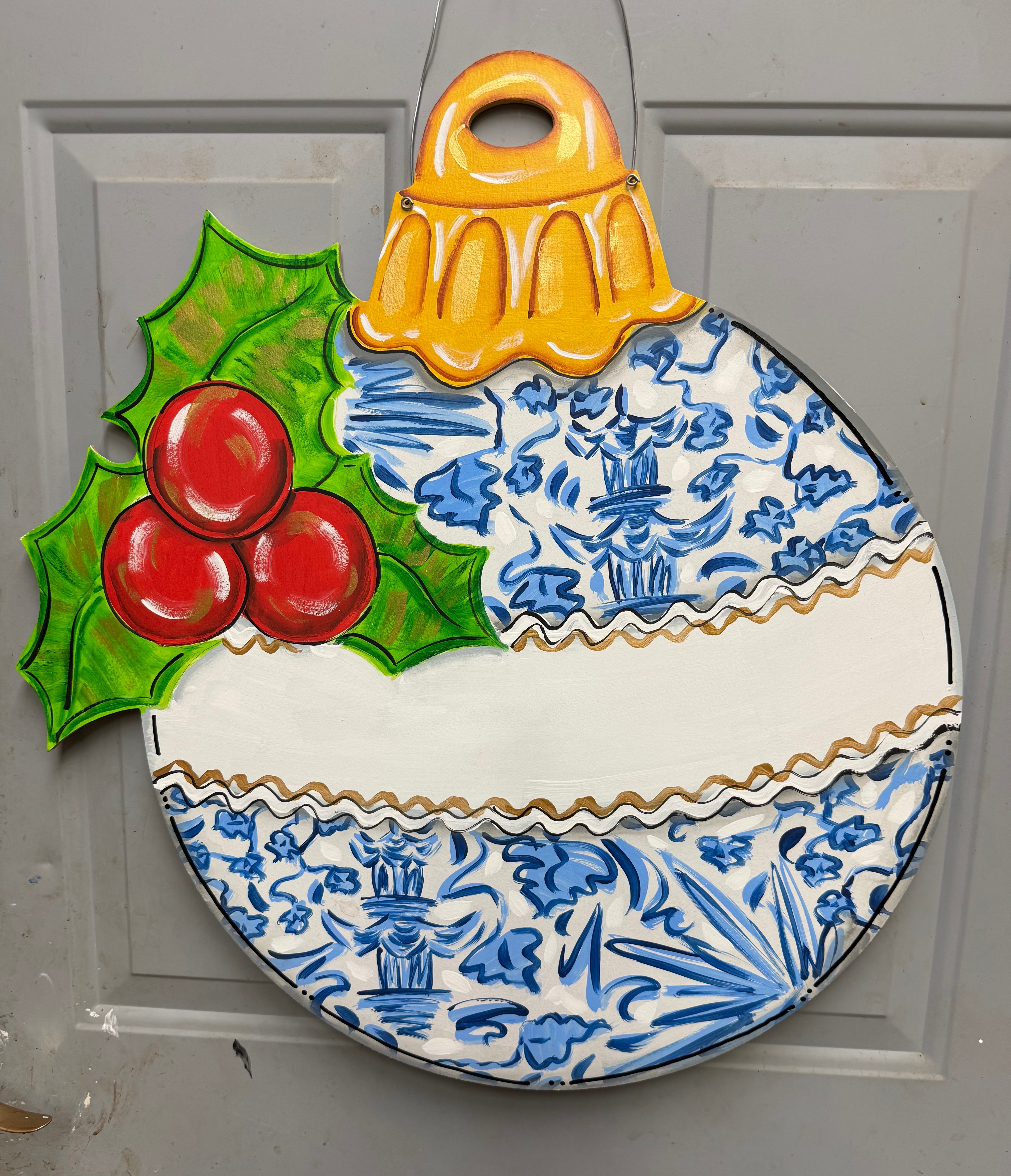 CINDY'S BLUE AND WHITE ORNAMENT WITH HOLLY