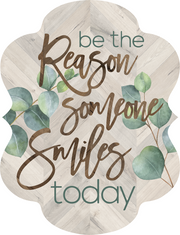 Print Shop Plaque MDF Cutout Be The Reason Someone Smiles Today With Eucalyptus Leaves On Wood Grain Background