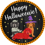 Print Shop Round MDF Cutout Happy Halloweenie! Three Dogs In Halloween Costumes On Dark Textured Background With Orange Border And Star Accents