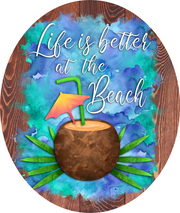 Print Shop Oval MDF Cutout Life Is Better At The Beach Coconut Drink With Green Straw And Palm Leaves